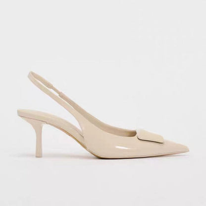 Mules ouvertes à l’arrière pour femme couleur blanche avec détail chaîne toe-toe et style sophistiqué